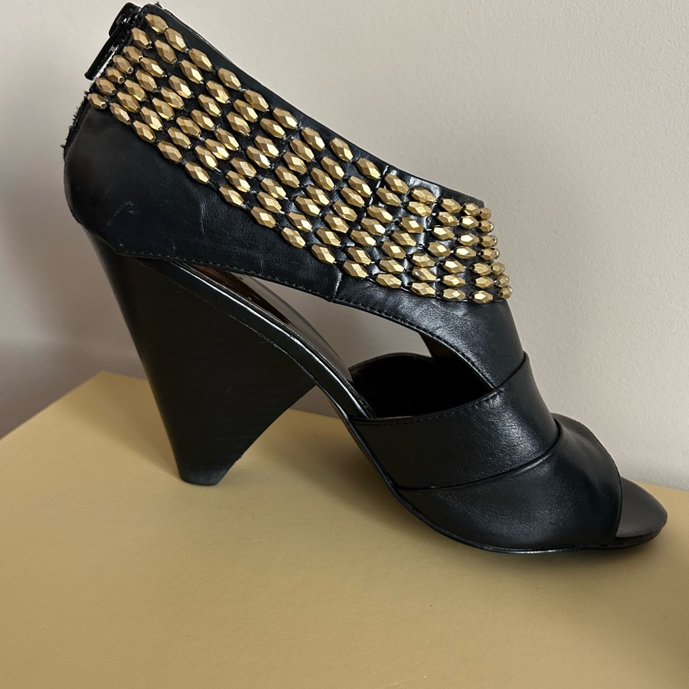 Carlos Santana Black Heels with Gold Detailing